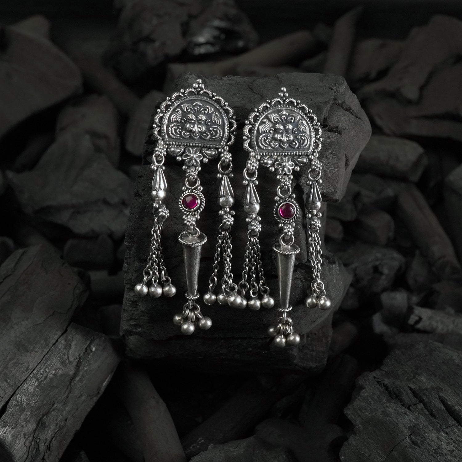 handmade silver jhumka design with kirthimukh pattern