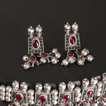 a silver chinchpeti earrings design with silver beads