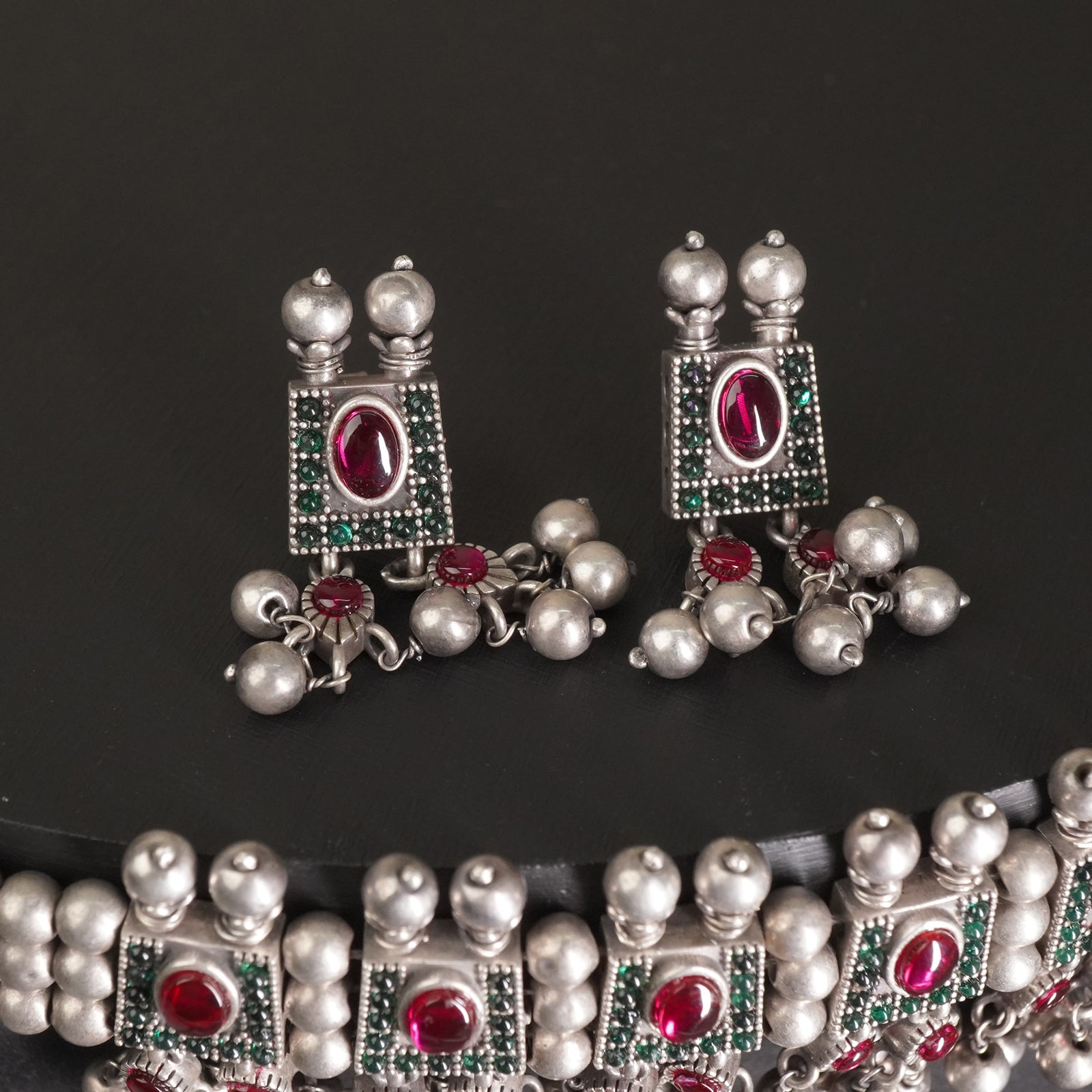 a silver chinchpeti earrings design with silver beads