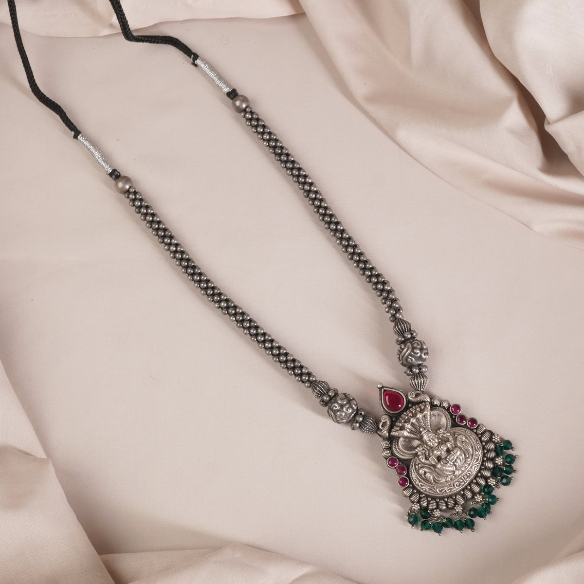 silver kolhapuri thushi necklace design with nagas laxmi pendant