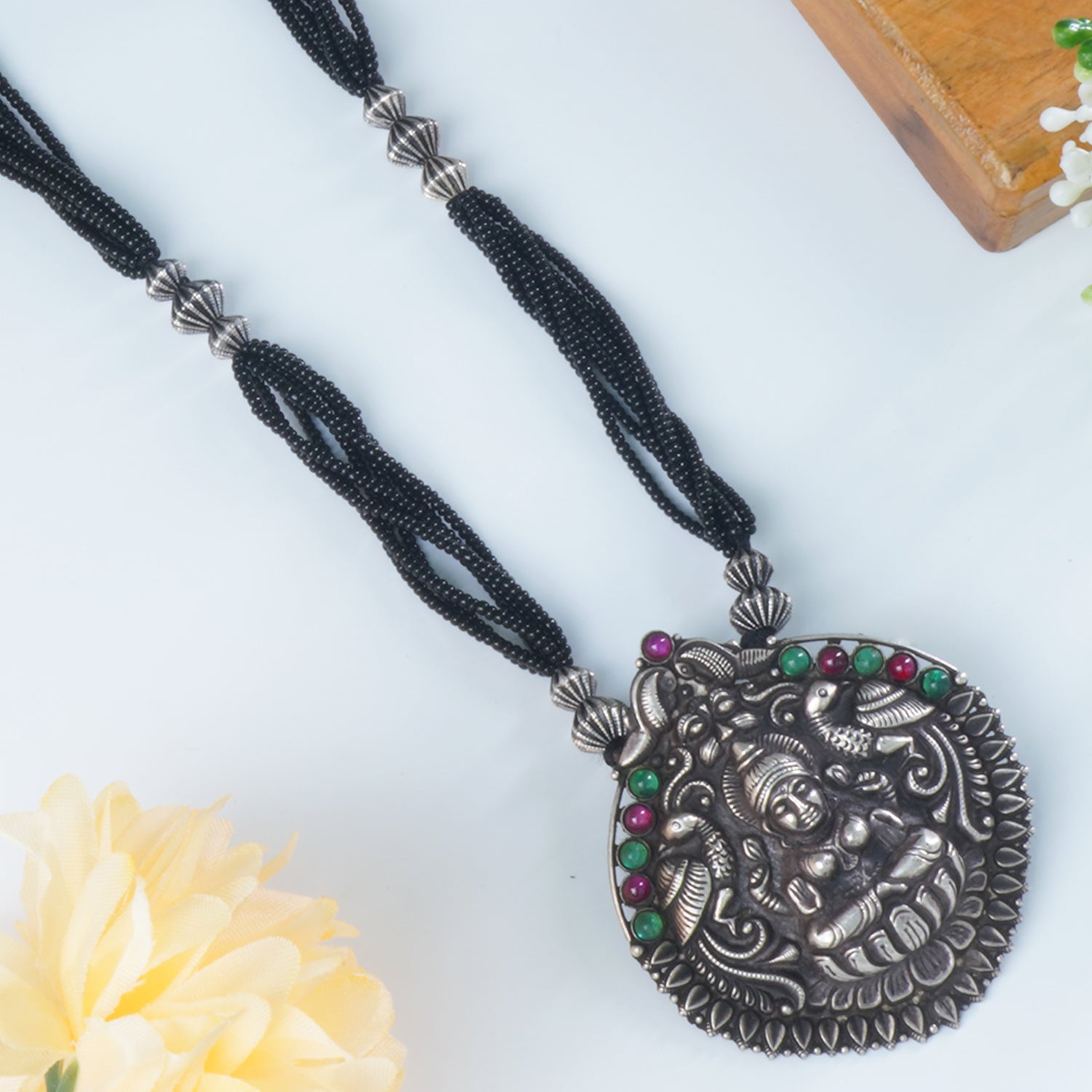 Shop Black Beads Silver Mangalsutra Design With HandCarved Pendant