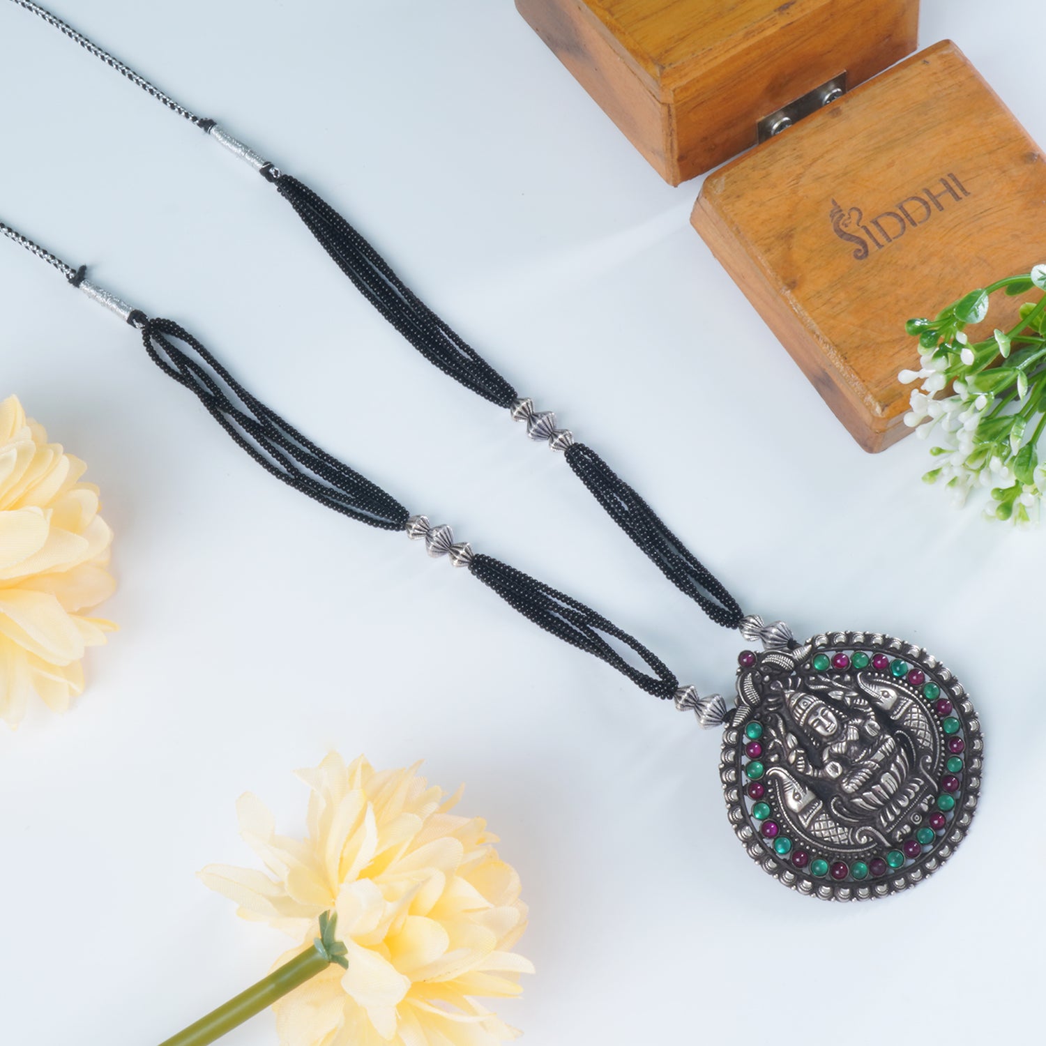 Buy Black Beads Silver Mangalsutra Design With HandCarved Silver Pendant