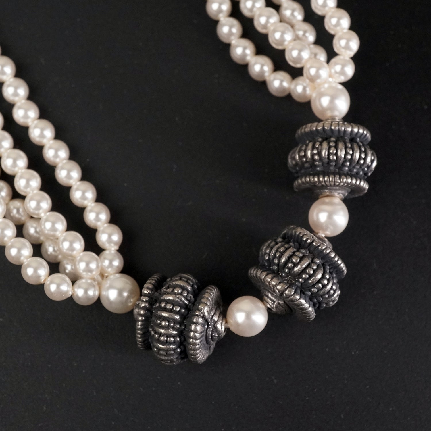 a close look at silver nakashi beads with swarovski pearls