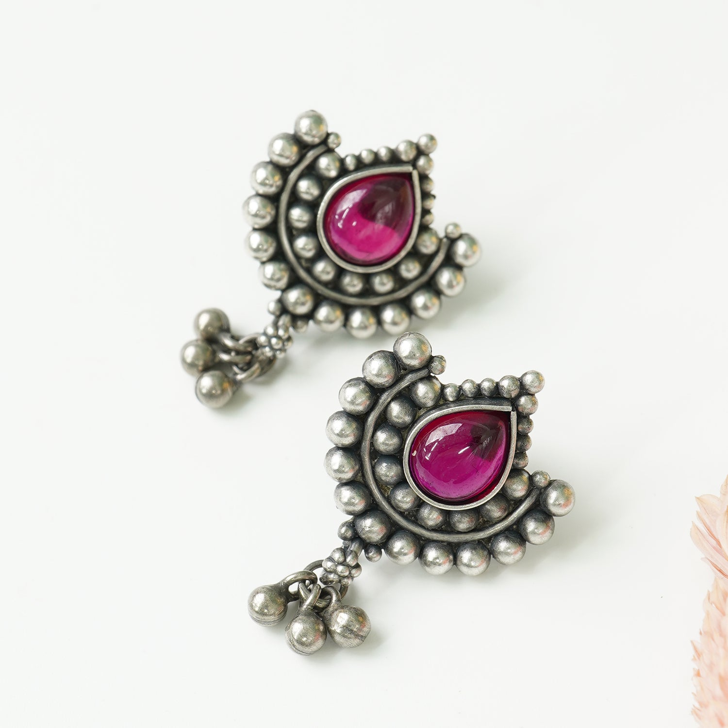 Pure Silver Oxidised Paan Shaped Earrings With Red Kemp Stone